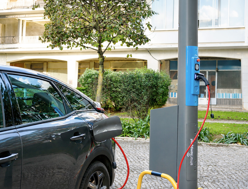 EV charging module on a shared smartlamppost pole in Cascais